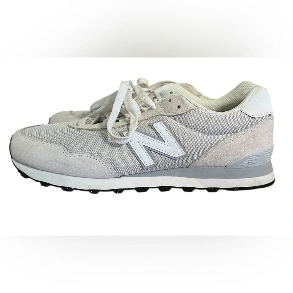 New Balance Grey / White athletic sneakers.